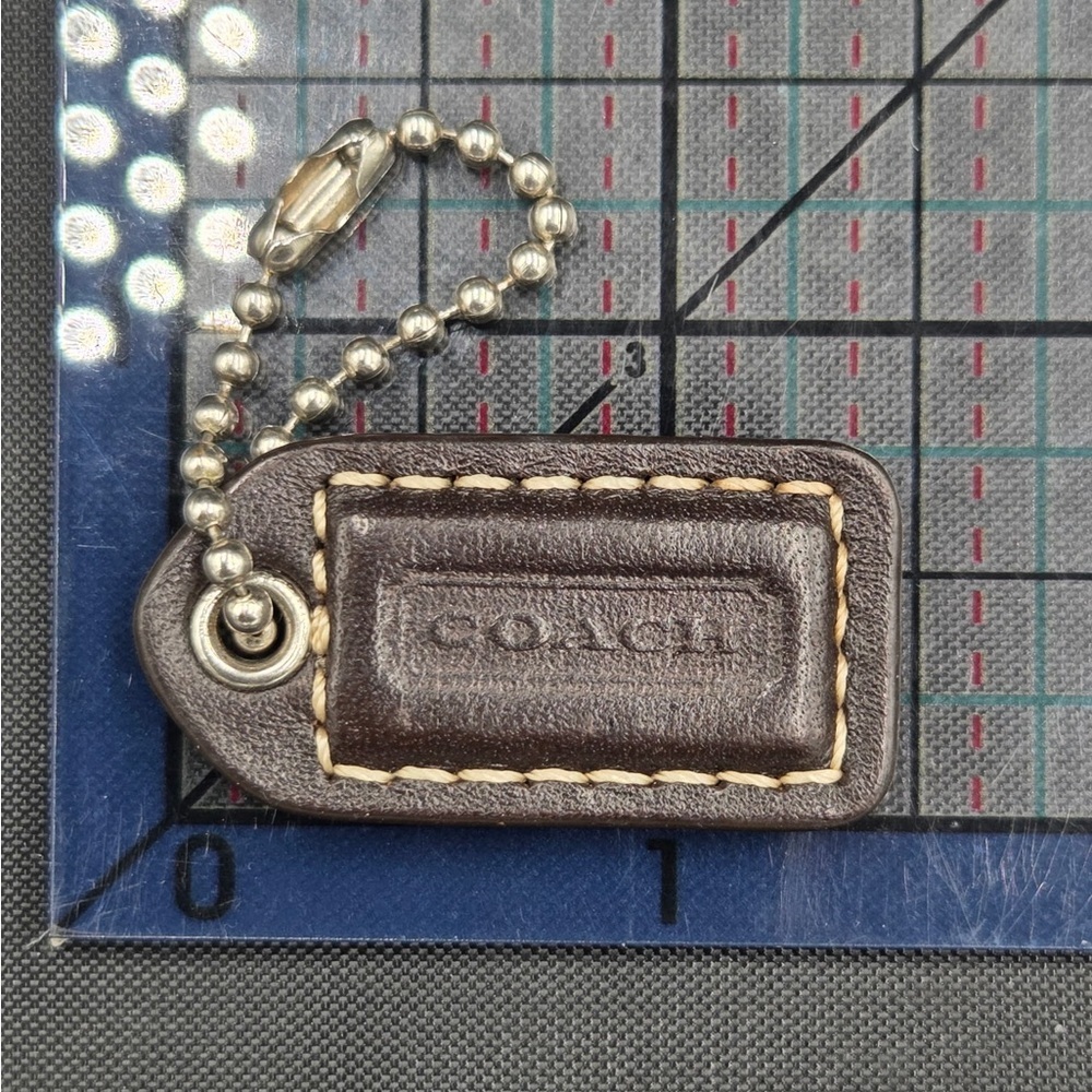 Coach Brown Leather mini hang tag